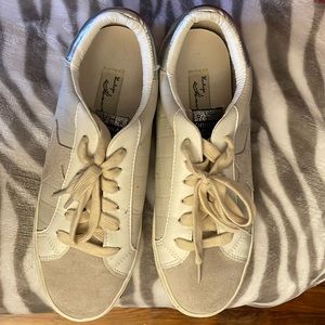 Women’s casual sneaker by vintage Havana light gray , white &off  White laces .